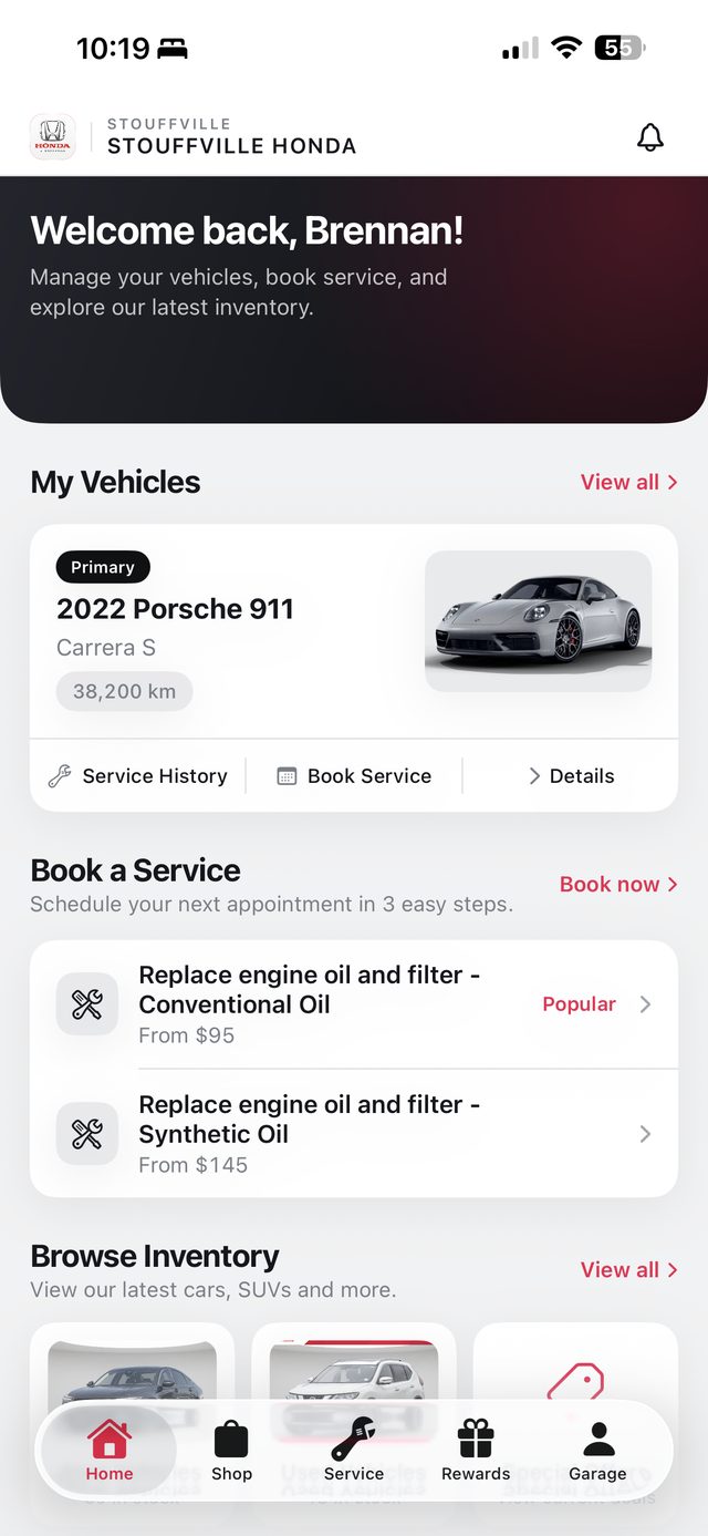 Home screen: welcome banner, my vehicles, book a service